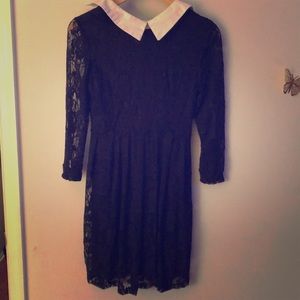 Black lace dress with white collar.